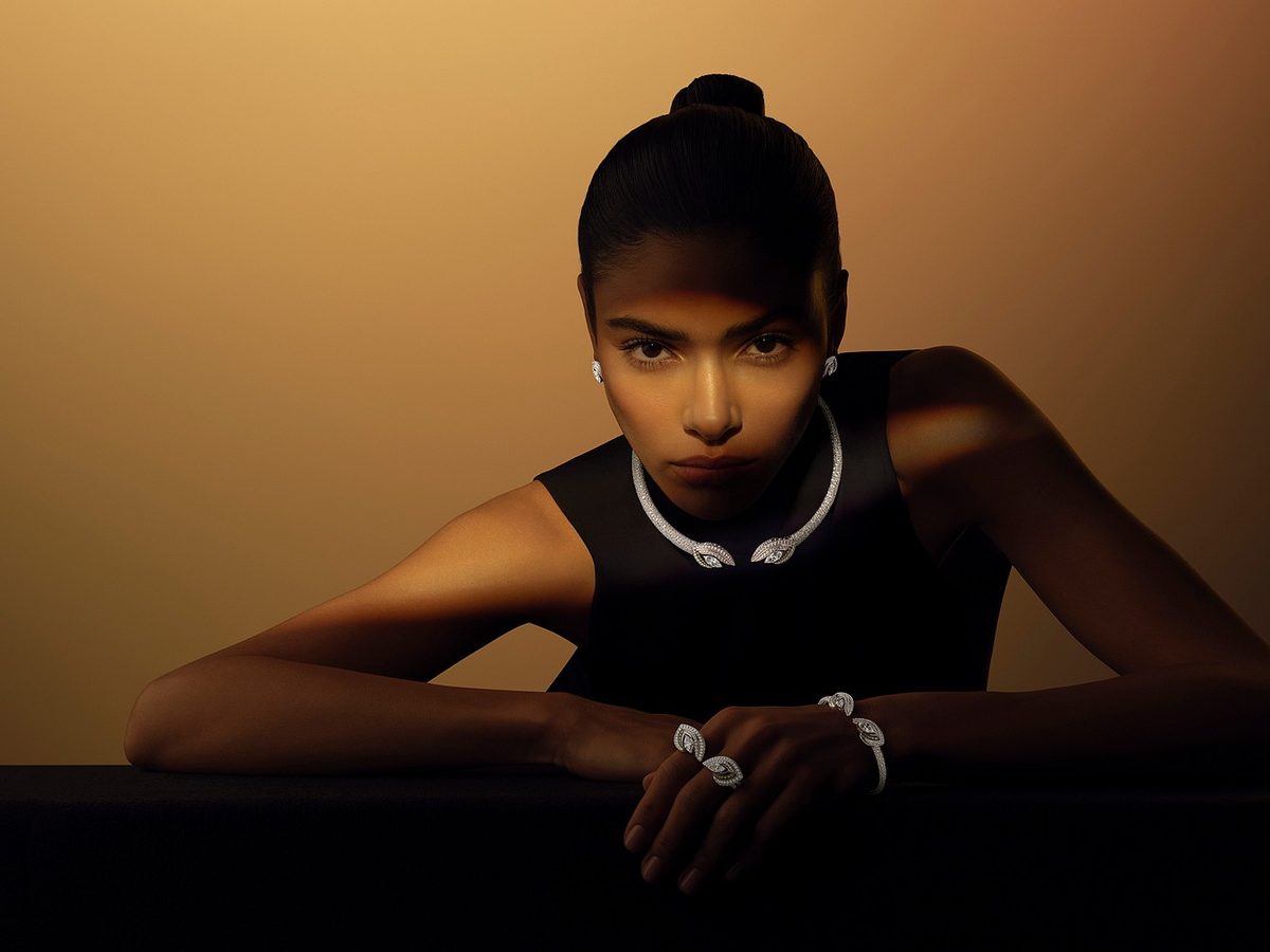 Jewellery campaign: model wearing a diamond collar, rings and cuff
